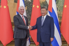 习近平会见古巴共产党中央委员会第一书记、古巴国家主席迪亚斯-卡内尔