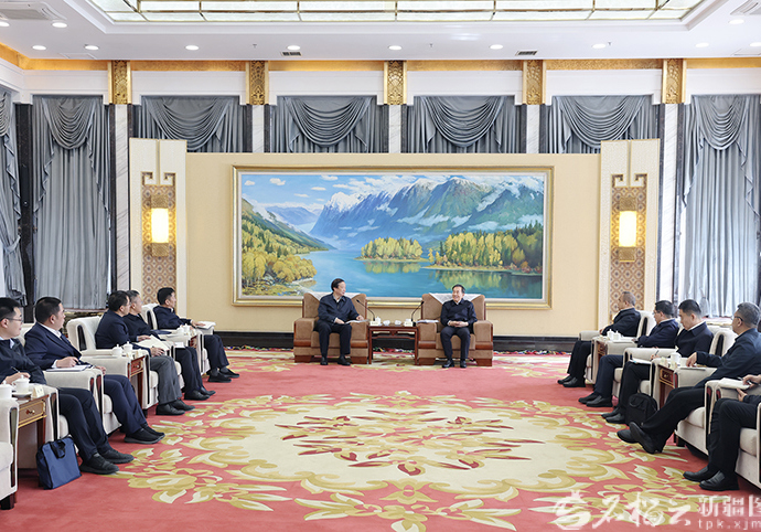 陈小江艾尔肯·吐尼亚孜会见国家烟草专卖局局长张建民