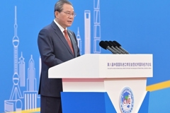 李强出席第八届中国国际进口博览会开幕式并发表主旨演讲