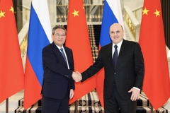 李强会见俄罗斯总理米舒斯京