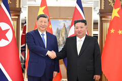 习近平同金正恩举行会谈